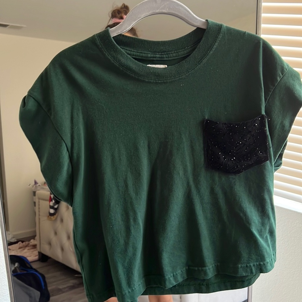 Green tshirt with black sparkly pocket